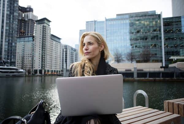 Woman Working Outdoors Using Laptop 600x403